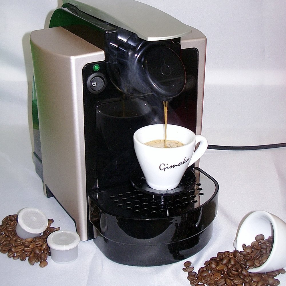 Cafetera de cápsulas, caja abierta